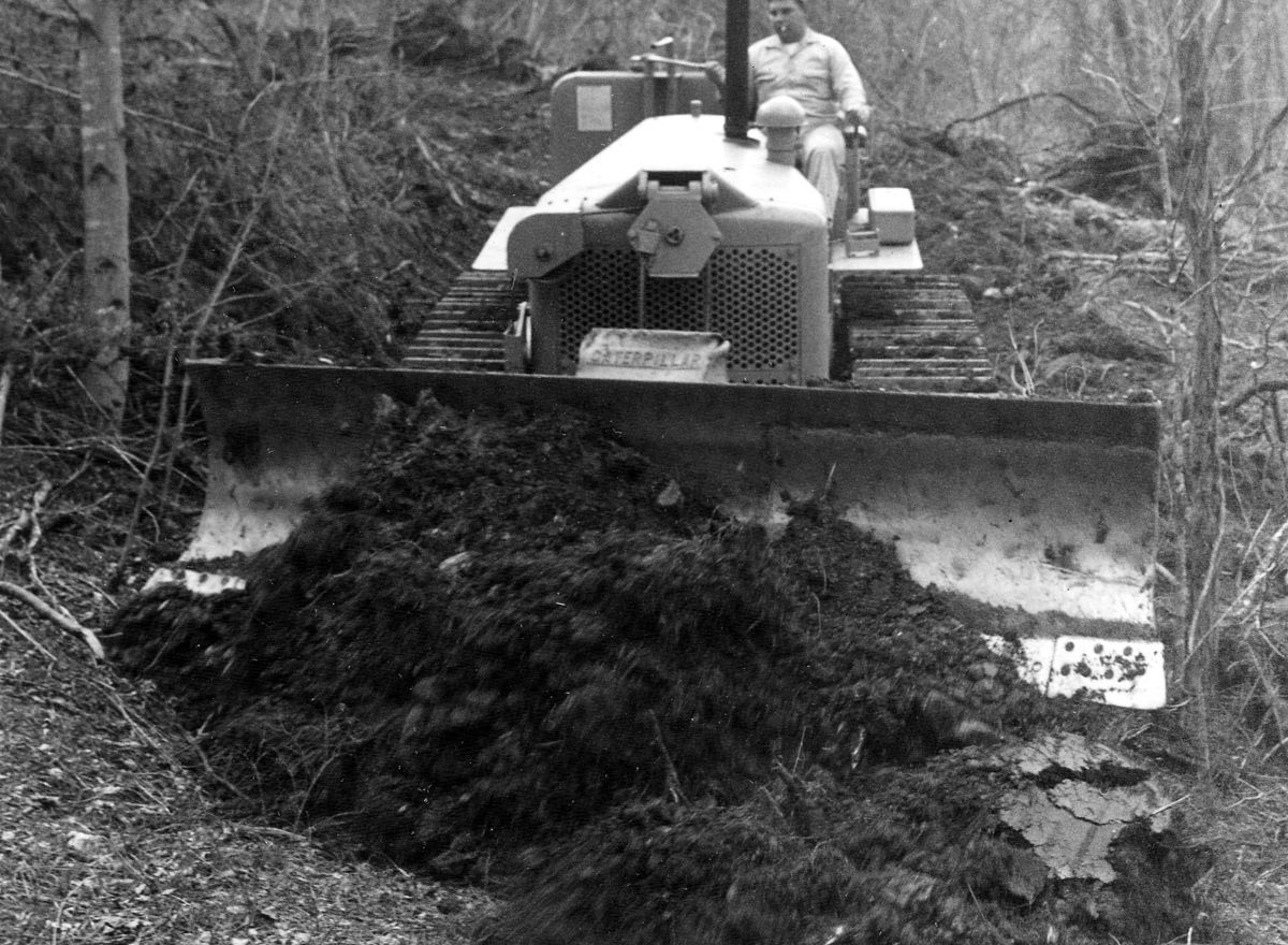 Cutting a road to the river March 13, 1958
